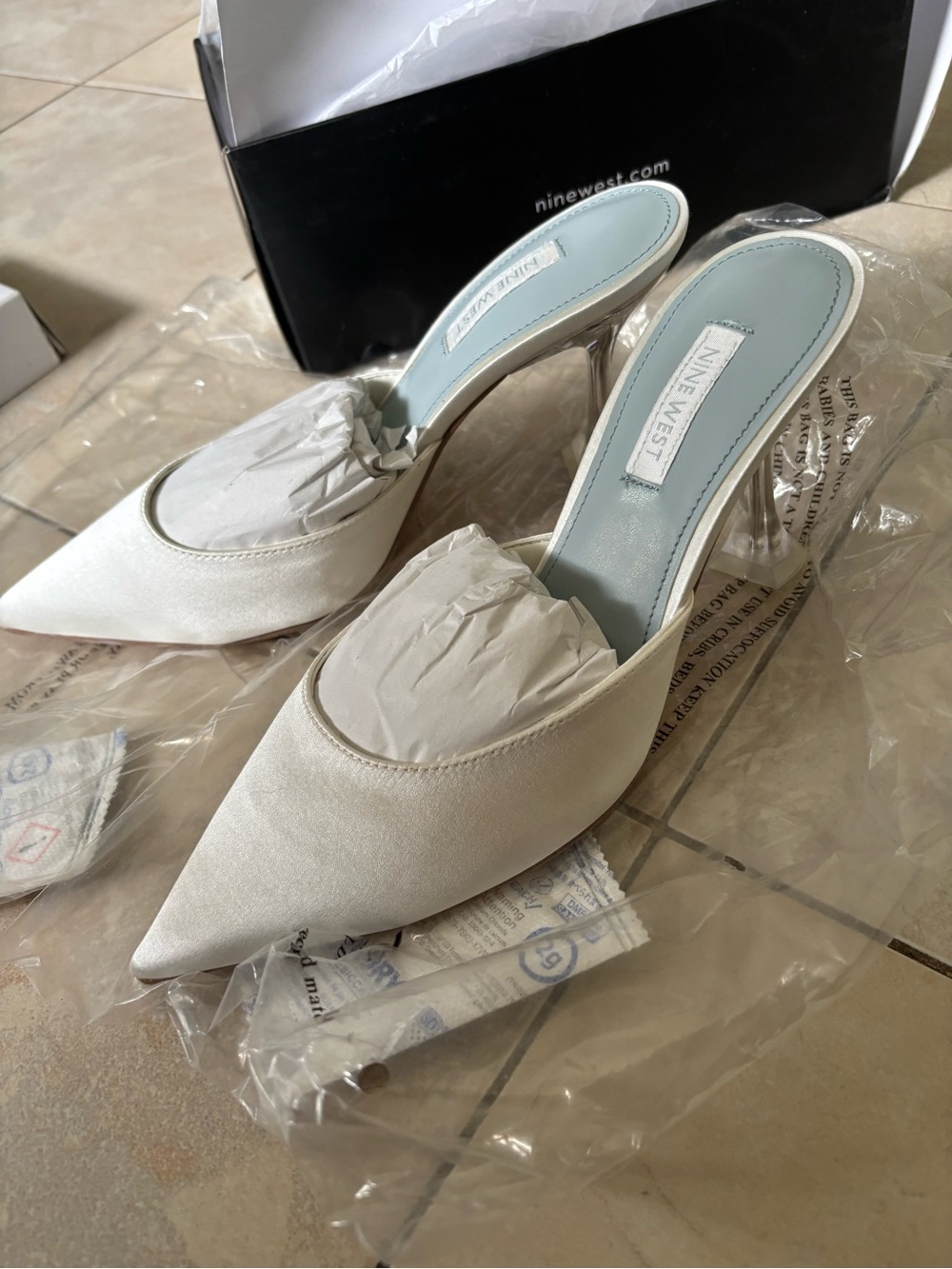 Nine West white satin mule in Size 6.